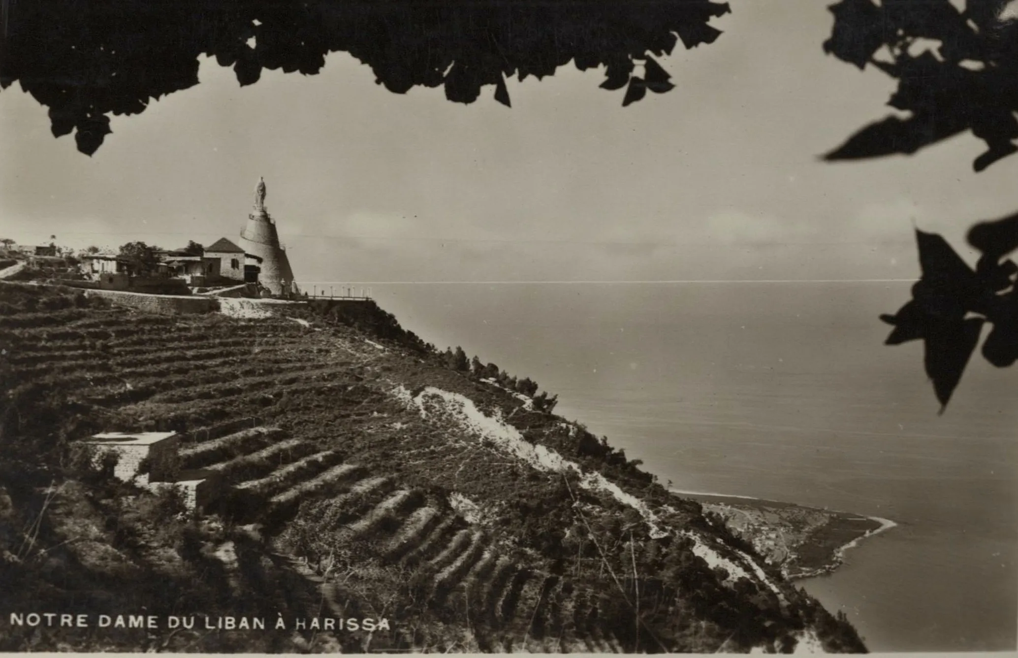 Postcard of Notre Dame du Liban at Harissa, the shrine overlooking terraced slopes and the sea
